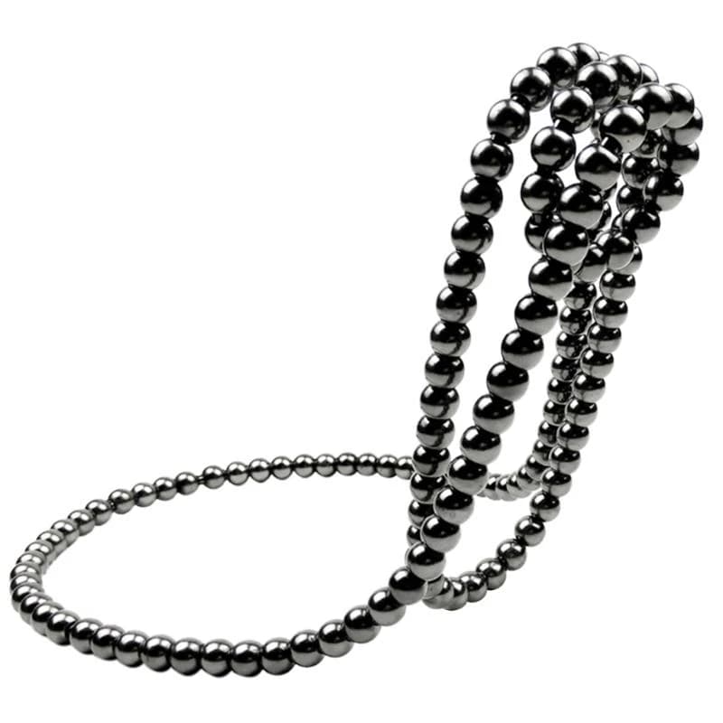 Kreatywny Stojak na Wino z Perłowym Naszyjnikiem - Nowość 🍷